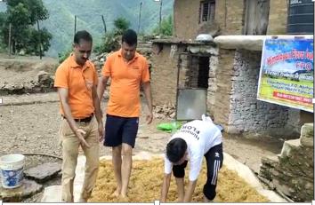 Villagers at work in a Himalayan village